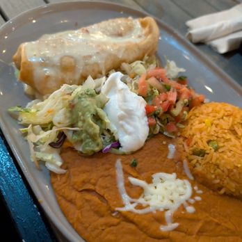 Las Carretas Mexican Restaurant signature dishes ChimichangasBirria TacosArroz Con Pollo